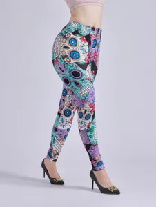 Women high waist stretch leggings with vibrant sugar skull and floral print detail view