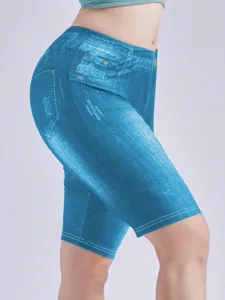 High-waist stretch faux denim print cycling shorts, slim fit casual leggings close-up view.