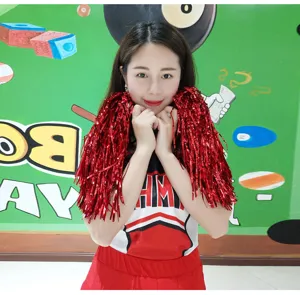 Cheerleading costume set with red pom-poms, perfect for dance performances and sports events.
