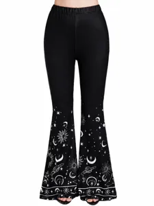High-waisted black flare pants for women, featuring celestial sun moon and star print at the hem.