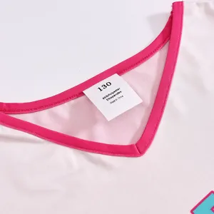 Details zum Kinder Cheerleading Kostüm V-Ausschnitt Gr 130 Materialzusammensetzung Etikett.
