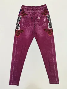 Detailed shot of women high waist stretch leggings featuring stylish butterfly print.