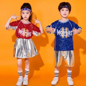 Kids cheerleading performance costume set, bright sequin top and metallic skirt for dance show.