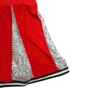 Red cheerleader skirt detail with silver sequins and striped hem for performance costume.