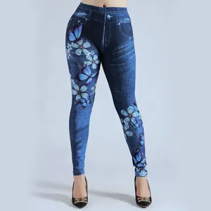 Women's high waist stretch leggings with fake denim blue butterfly flower print detail.