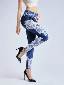Milk silk high-waisted leggings with elegant lace print, stretchy slim fit long pants for women.