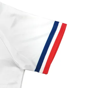 Kids performance costume short sleeve detail with classic red white blue stripe cuff design.