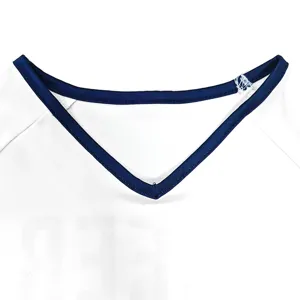 White girls cheerleading top detail with blue v-neck trim, summer sports uniform piece.