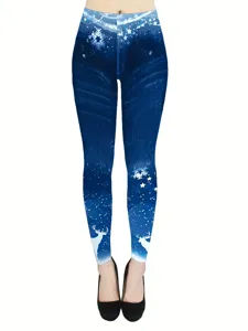 Close-up detail of women's high-waisted stretchy leggings featuring denim print and Christmas deer.