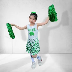 Kids cheerleading uniform set with green clover pattern, sleeveless dress and pom poms.
