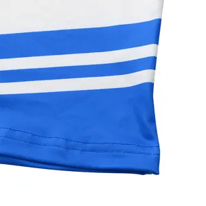 Detailed close-up of blue cheerleading costume sleeve featuring clean white parallel stripes.