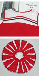 Cheerleading uniform detail shot displaying the red and white pleated skirt and top.