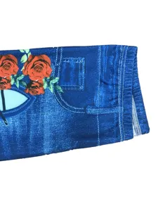 Detailed view of the high waist elastic denim print leggings fabric with vibrant red roses.