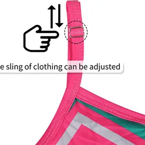 detail view of adjustable strap kids cheerleading performance outfit top pink and green