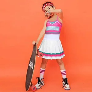 Children cheerleader costume set detail view, featuring pink top and white pleated skirt.