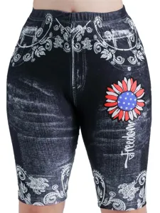 Women high-waist slimming print denim-effect biker shorts with sunflower and freedom graphic.
