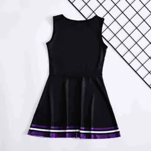 Detailed view of the kids black cheerleading dress skirt with purple white stripes.