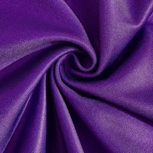 High quality purple fabric detail shot for cheerleading costumes and dance wear performance.