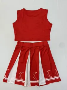 Red and white cheerleading outfit detail, crop top and pleated skirt with moon print.
