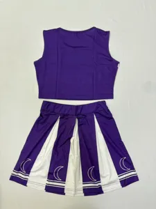 Women purple cheerleading crop top and pleated skirt set with cute moon print detail.