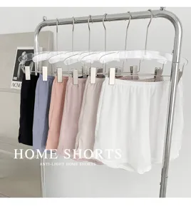 Hanging collection of multi-color casual home shorts featuring anti-light design and side slits.