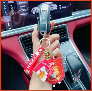 Detailed view of the cute lucky cat Rubik's cube keychain with strap, perfect for car keys.