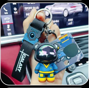 Trendy cute bear silicone keychain charm for car keys, stylish bag pendant gift idea.