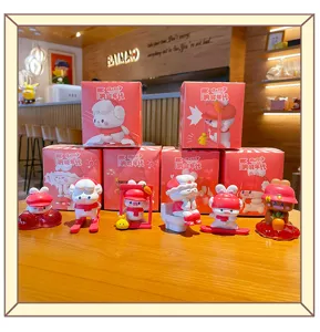 Cute Chinese trendy rabbit resin figurine for desktop and car decoration. Detailed view of cute figures.