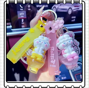 Detailed shot of cute rabbit oil-filled keychain and bag pendant, exquisite design with vibrant strap.