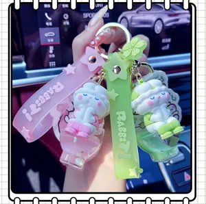 Cute cartoon rabbit toilet liquid keychain floating oil key ring bag pendant lovely charm