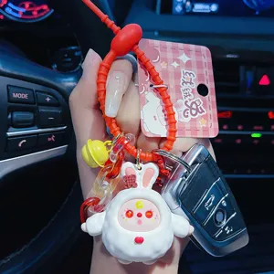 Cute cartoon fluffy rabbit keychain for women and men, stylish bag charm and car key ring.