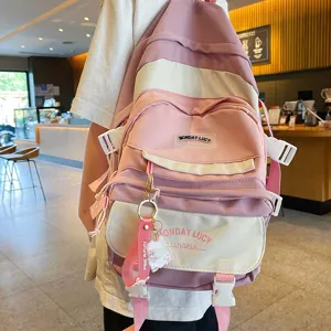 Casual pink white canvas backpack with cute pendant, multi-pocket school bag for women daily use.
