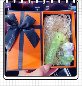 Cute rabbit floating oil keychain in luxury gift box, trendy car key pendant bag charm accessory.