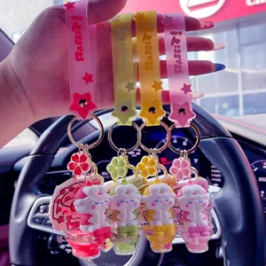 Cute liquid-filled cartoon rabbit keychain with silicone strap and metal ring accessories.