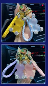Cute rhinestone resin rabbit keychain with braided strap for car keys and bags detail view.