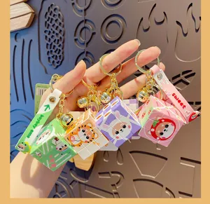 Mini cute animal Rubik's cube keychain detailed view showcasing colorful cartoon styles.