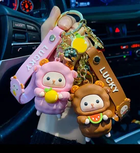 Cute cartoon sheep keychain detail view, stylish drip-glue silicone pendant for bags and keys.