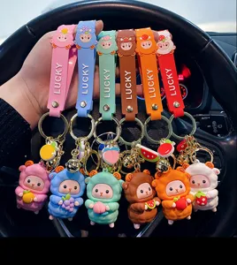 Cute silicone sheep keychain with fruit charms, stylish cartoon bag pendant for women.