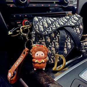 Cute sheep keychain for women, stylish cartoon doll bag pendant with lanyard charm.