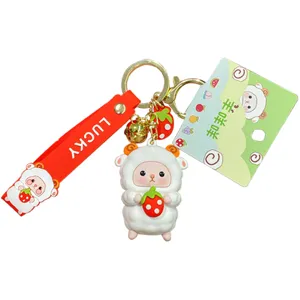 Cute cartoon sheep keychain with strawberry pendant and metal ring, stylish bag charm for women
