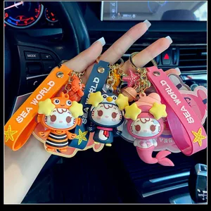 Ocean series cartoon keychain, cute silicone strap bag charm and car key pendant detail shot.