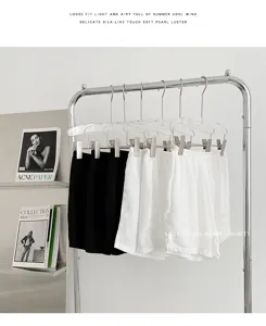 Comfortable loose-fit summer home shorts with anti-glare design and side split for women.