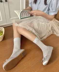 Calcetines de malla estilo coreano para mujeres con detalles de lazos lindos, estilo dulce.