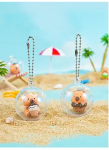 Cute capybara gacha keychain toy in transparent ball, perfect creative mini gift and cute accessory.