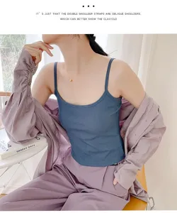 Close-up detail of women's ribbed knit camisole vest showing fine texture and slim fit.