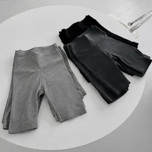 Comfortable high-elasticity ribbed four-quarter leggings for women, perfect for daily wear.