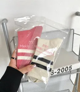 Women two-bar striped mid-tube socks, autumn fashion casual pile socks in independent packaging.