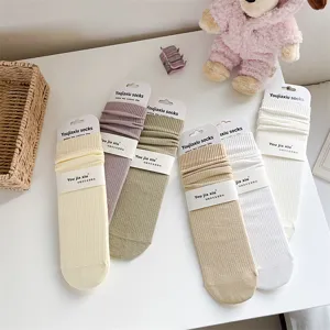 Women's solid color ribbed cotton mid-tube socks autumn and winter new comfortable style.