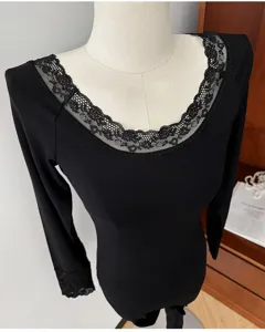 Women's black thermal underwear base layer with elegant lace trim U-neck and long sleeves.