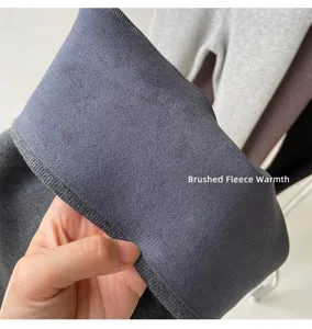 Detailed view of women thermal fleece lined ribbed high waist yoga leggings with soft inner.